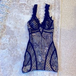 bebe Hemmed Black & Nude Lace Bodycon
Mini Dress